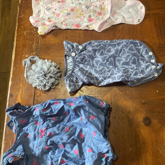 Baby girl clothes and diapers